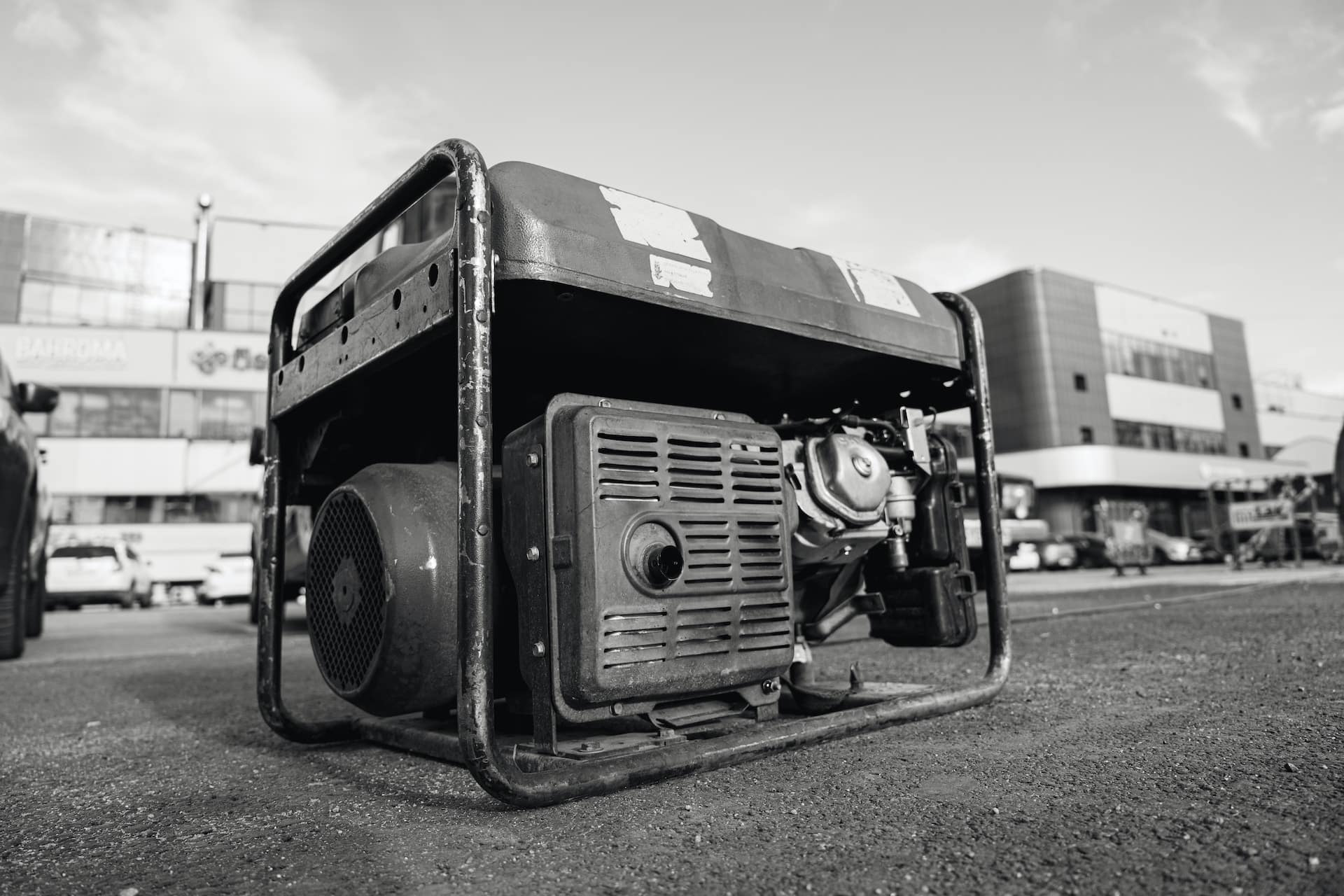 Black and white image of a generator installed by Laswell Electric, providing reliable backup power for homes in Kentucky and Indiana.