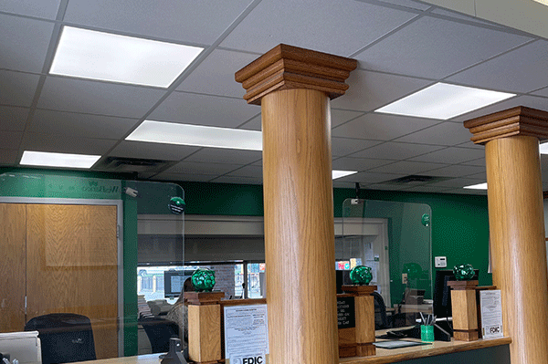 Bright, modern interior of Wesbanco in New Albany, IN after LED lighting installation by Laswell Electric, highlighting energy-efficient fixtures and enhanced visibility for a welcoming banking environment.